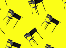 On a fluro yellow background are a series of chairs with desks attached looking as though they are raining down from the sky.