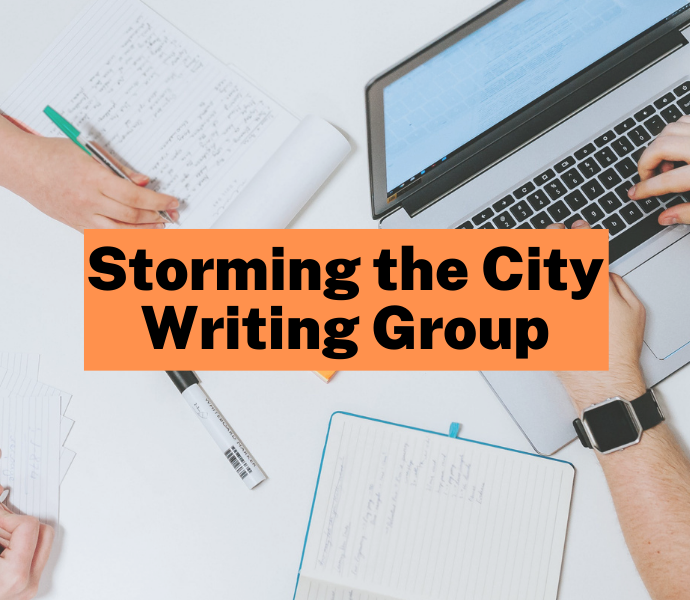A photo of various hands writing on a laptop, a pad of paper, and note cards, on a white table. Black text inside an orange block on top of the image says 'Storming the City Writing Group'