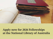 Aged archival books are stacked on a table with one volume open to a page that is scrawled across with cursive handwriting. Text at the bottom of the image reads: Apply now for 2026 Fellowships at the National Library of Australia.